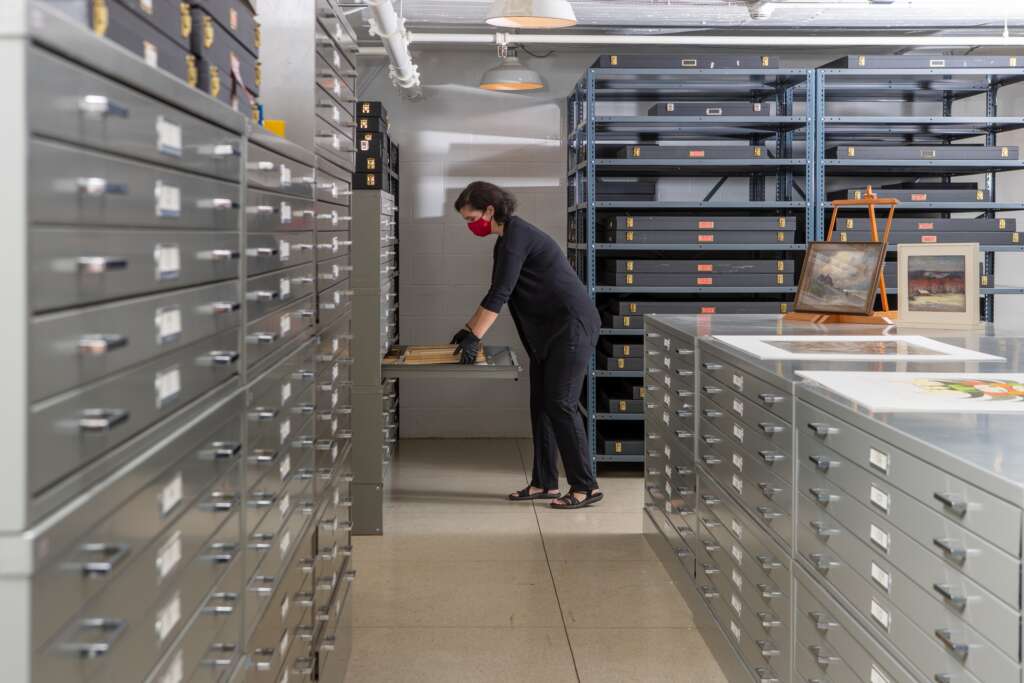 Museum paper center picture in the process of storing a picture in a physical storage.