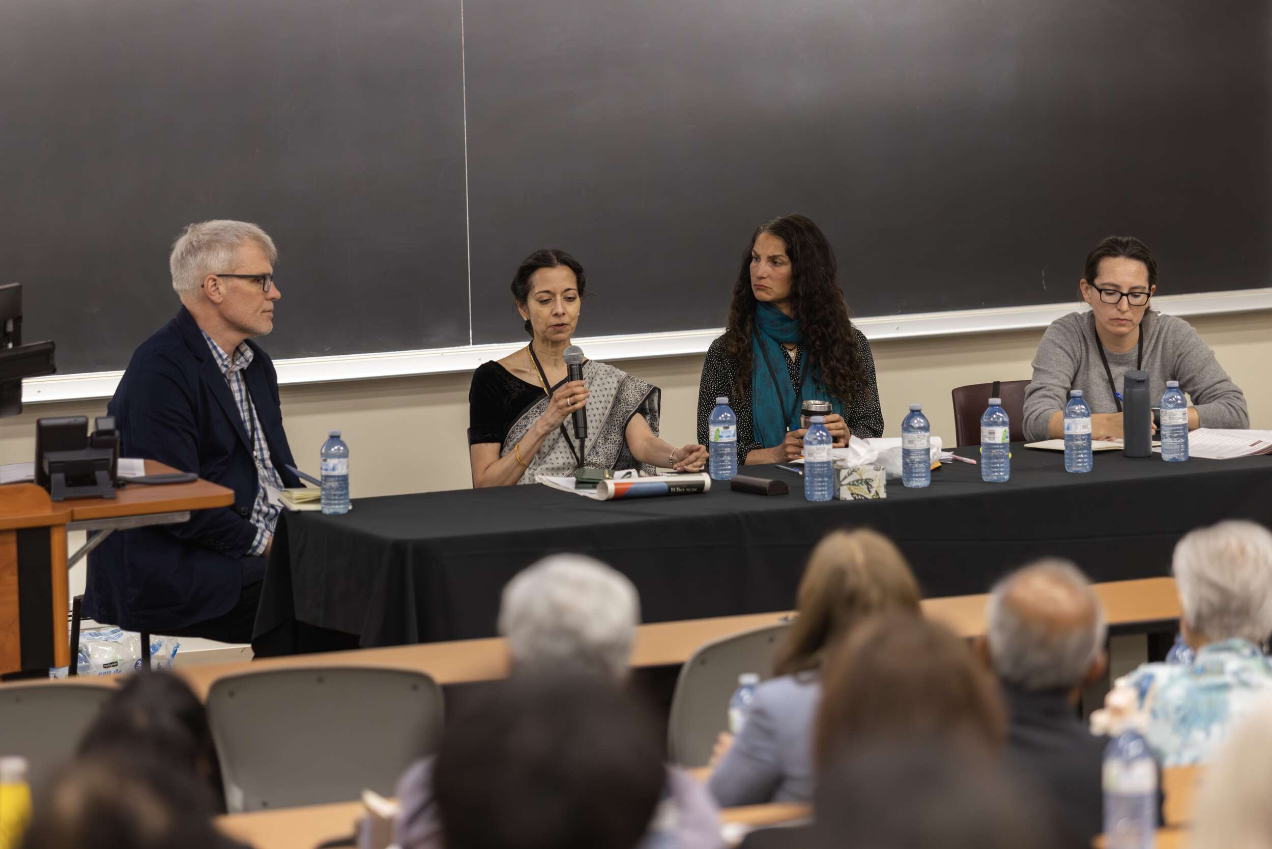 Meera Nair speaks during the Air India Narratives in Teaching, Media, and Government Discourse panel, with (from left to right): moderator Steve Hewitt, and co-panelists Maya Seshia and Jessica Young.