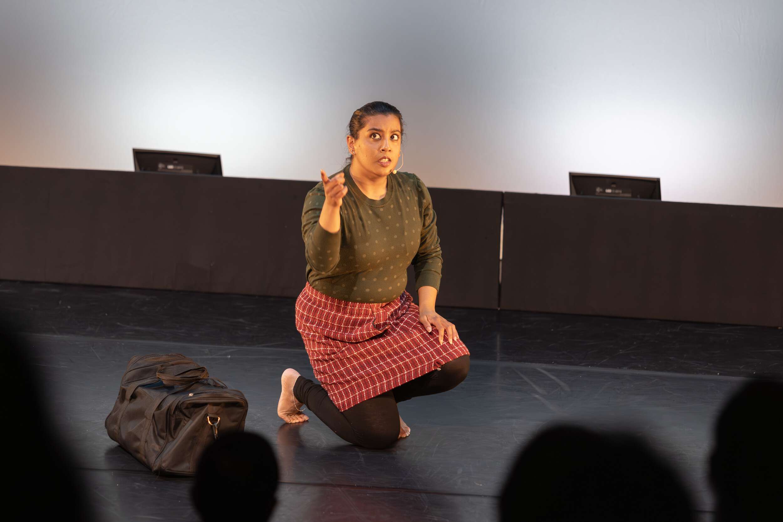 A dancer from Sampradaya Dance Creations performs a work co-directed by Suma Suresh and Lata Pada, honoring the 40th anniversary of the Air India Flight 182 tragedy.