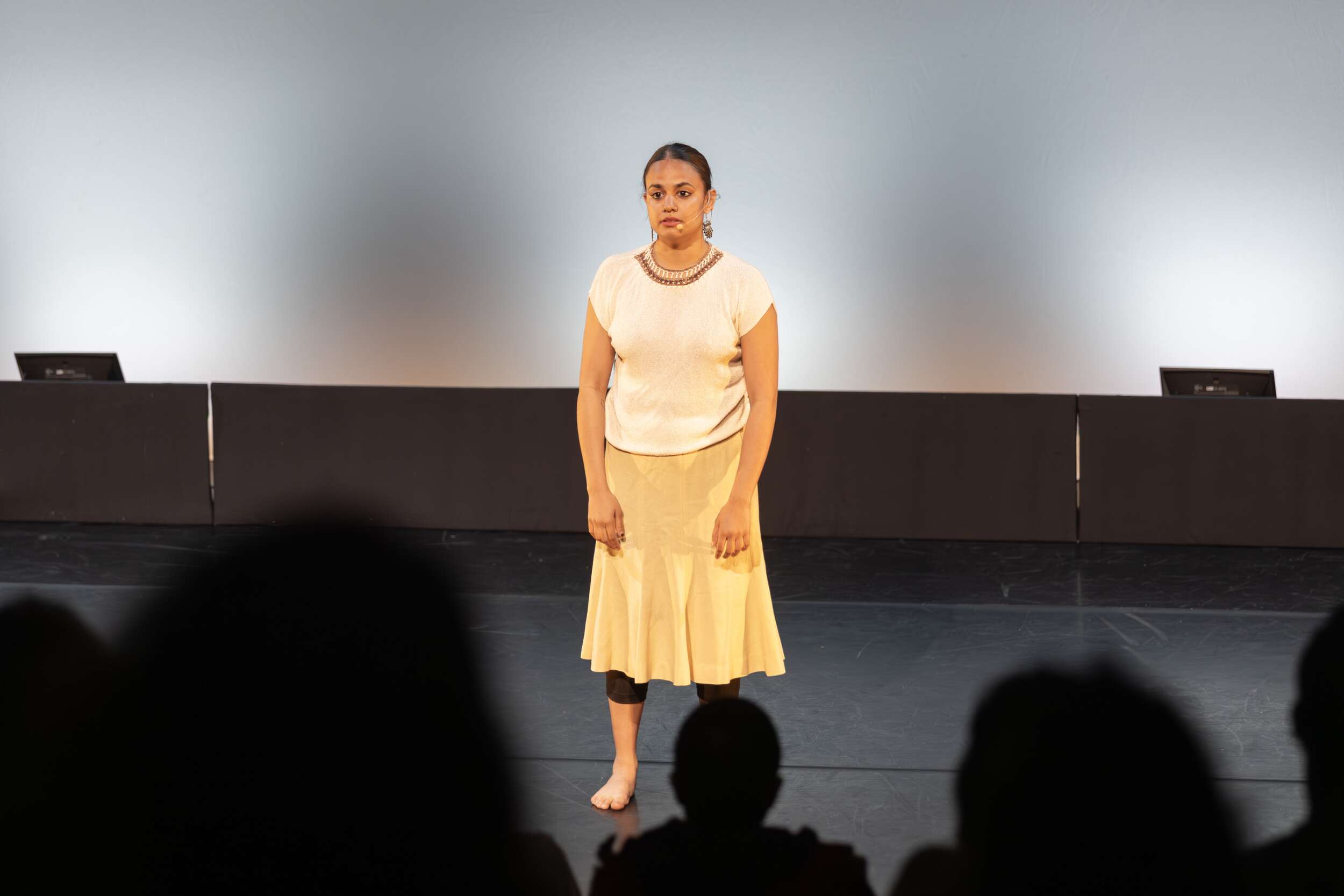 A dancer from Sampradaya Dance Creations performs a work co-directed by Suma Suresh and Lata Pada, honoring the 40th anniversary of the Air India Flight 182 tragedy.