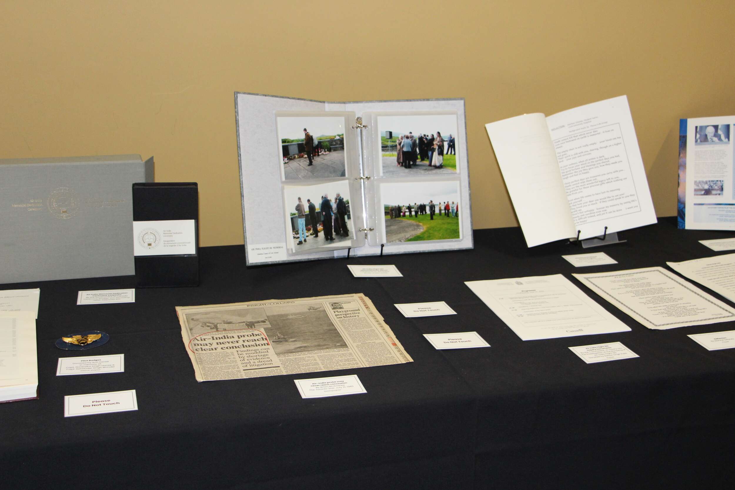 A selection of materials donated to Air India Flight 182 Archive, on display as a physical exhibit.