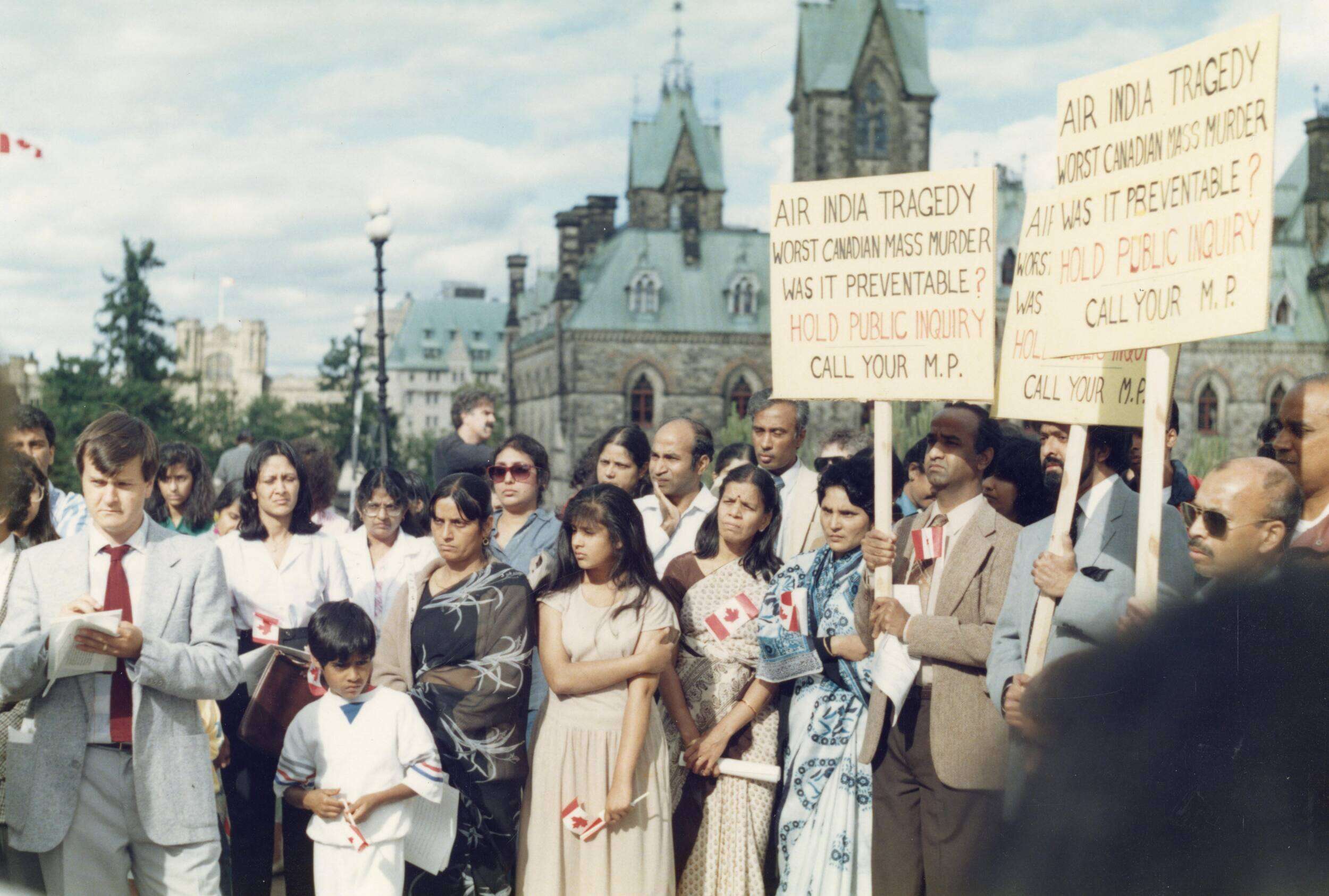 Family and friends of the Air India Flight 182 victims attending demonstration calling for a public inquiry, Parliament Hill, Ottawa, ON, June 23, 1988; photo by Sundaram (Ramu) Ramakesavan