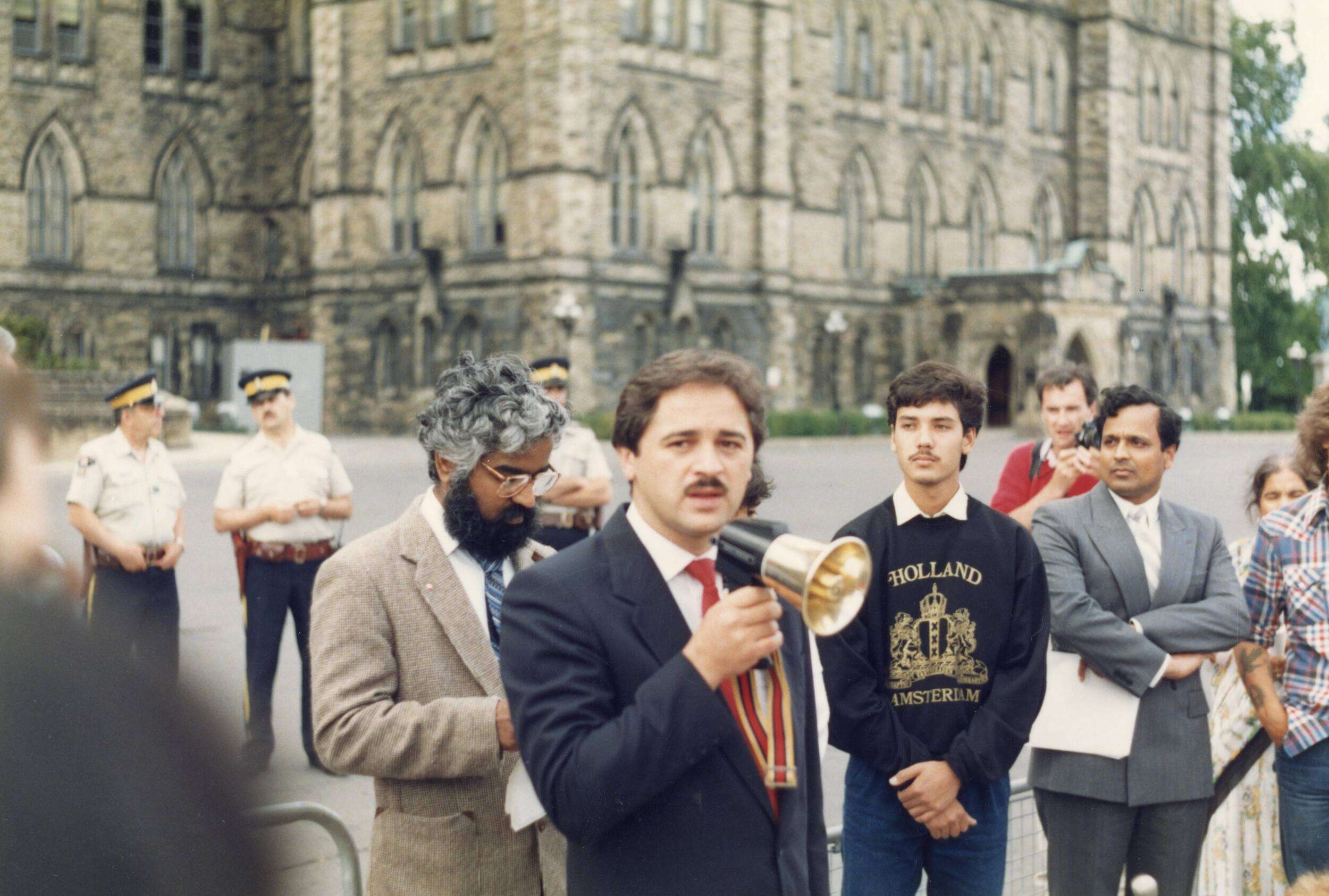 Member of Parliament Brian Tobin, Bona Vista-Trinity-Conception, Newfoundland, at Air India Flight 182 demonstration calling for a public inquiry, Parliament Hill, Ottawa, ON, June 23, 1988; photo by Sundaram (Ramu) Ramakesavan