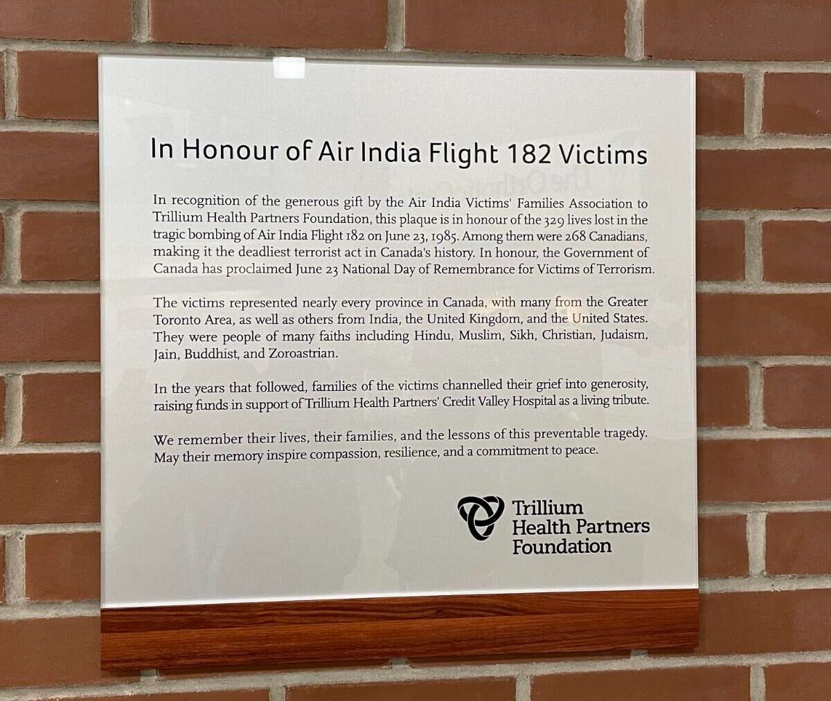 A plaque installed in memory of the Air India Flight 182 victims in the main hallway of Credit Valley Hospital, Mississauga, ON, in 2026, replacing an earlier plaque placed on April 7, 1990; photo by Deepak Khandelwal
